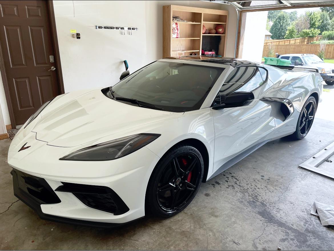Blacked-out custom powder coated wheels by Complete Wheel Restoration Arkansas
