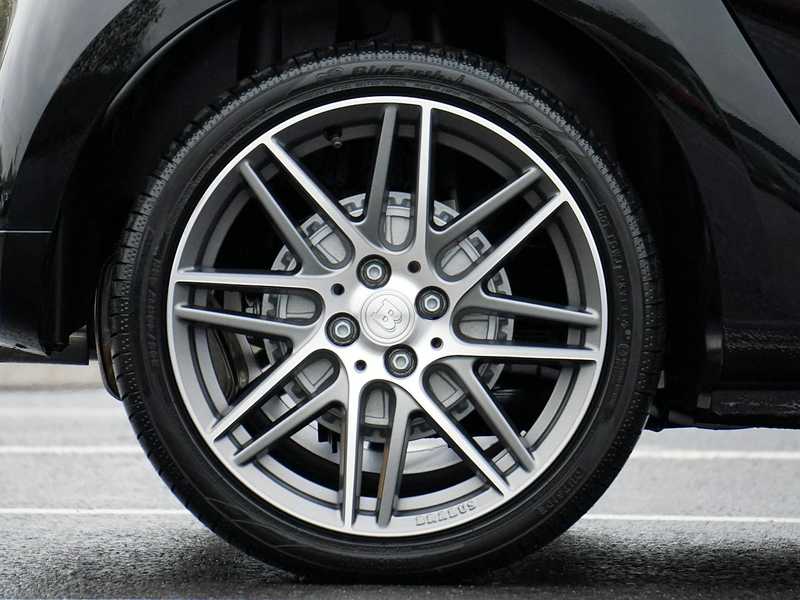 Wheel removed from vehicle for factory-spec repair at Complete Wheel Restoration NLR AR